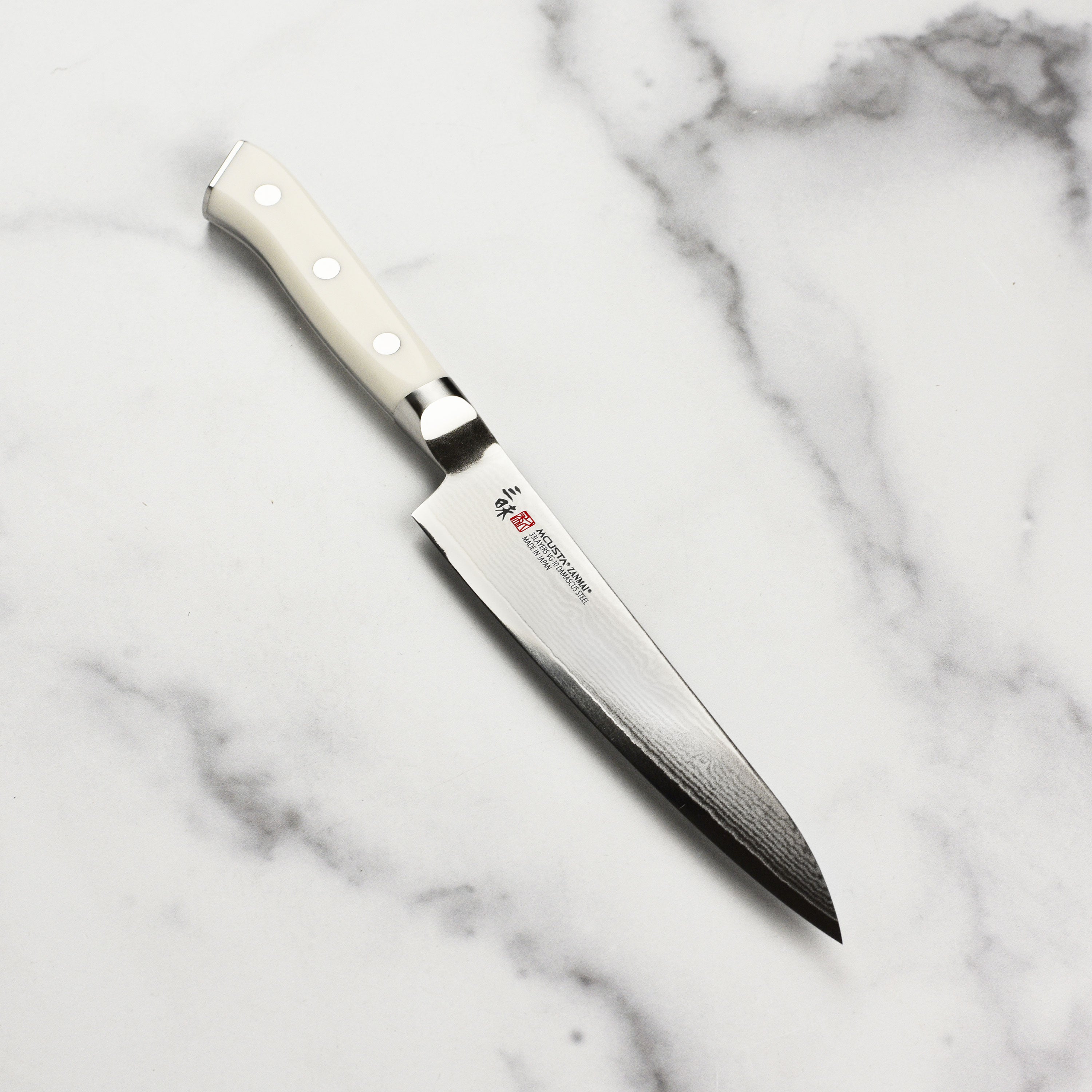 Zanmai Classic Damascus Corian 5.9