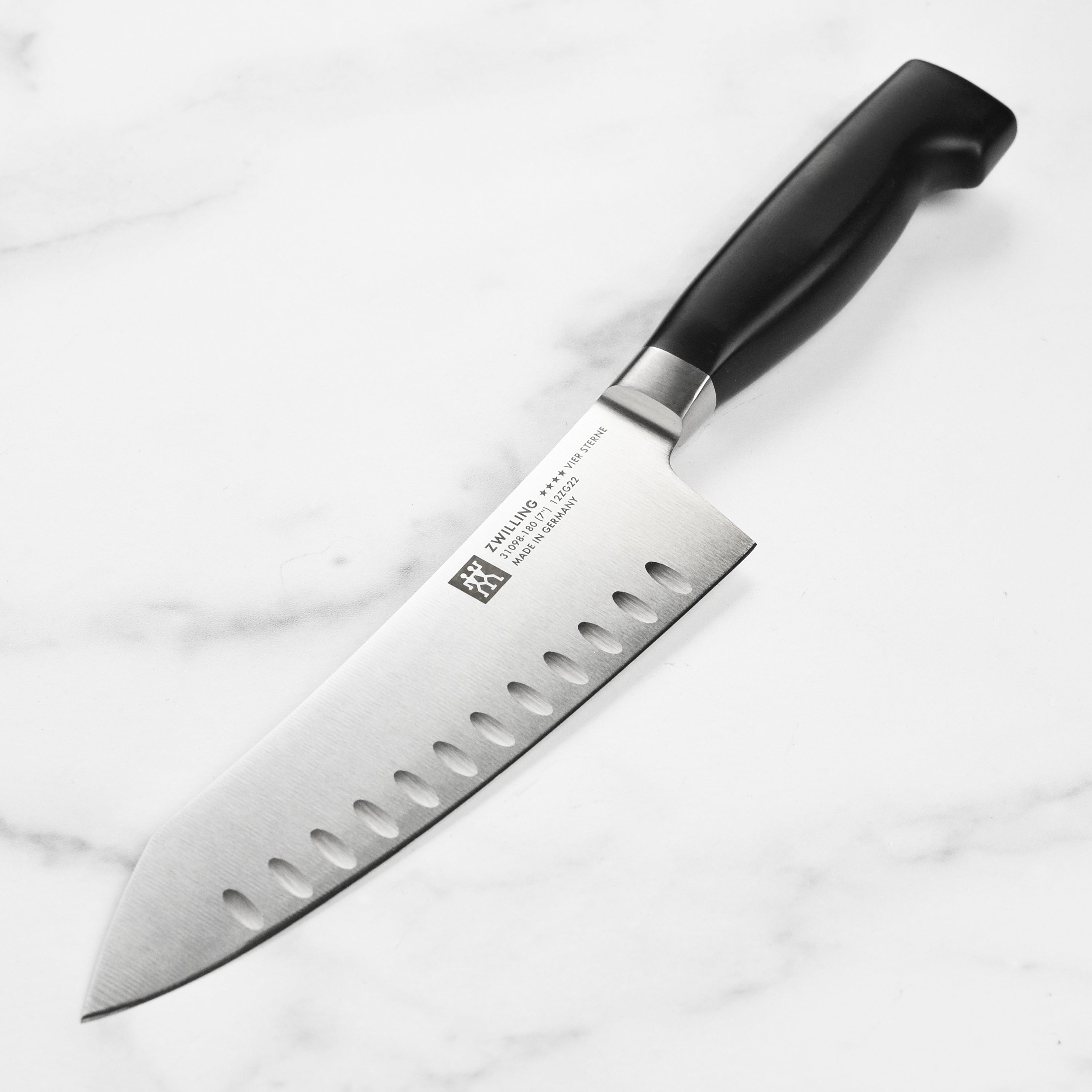 Zwilling J.A. Henckels Four Star Rocking Santoku Knife - 7