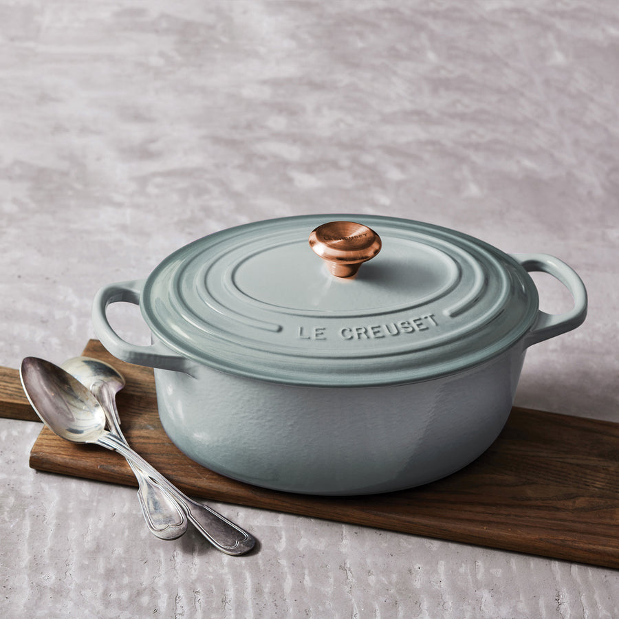 Le Creuset Signature Cast Iron 8-quart Sea Salt Oval Dutch Oven with Copper Knob