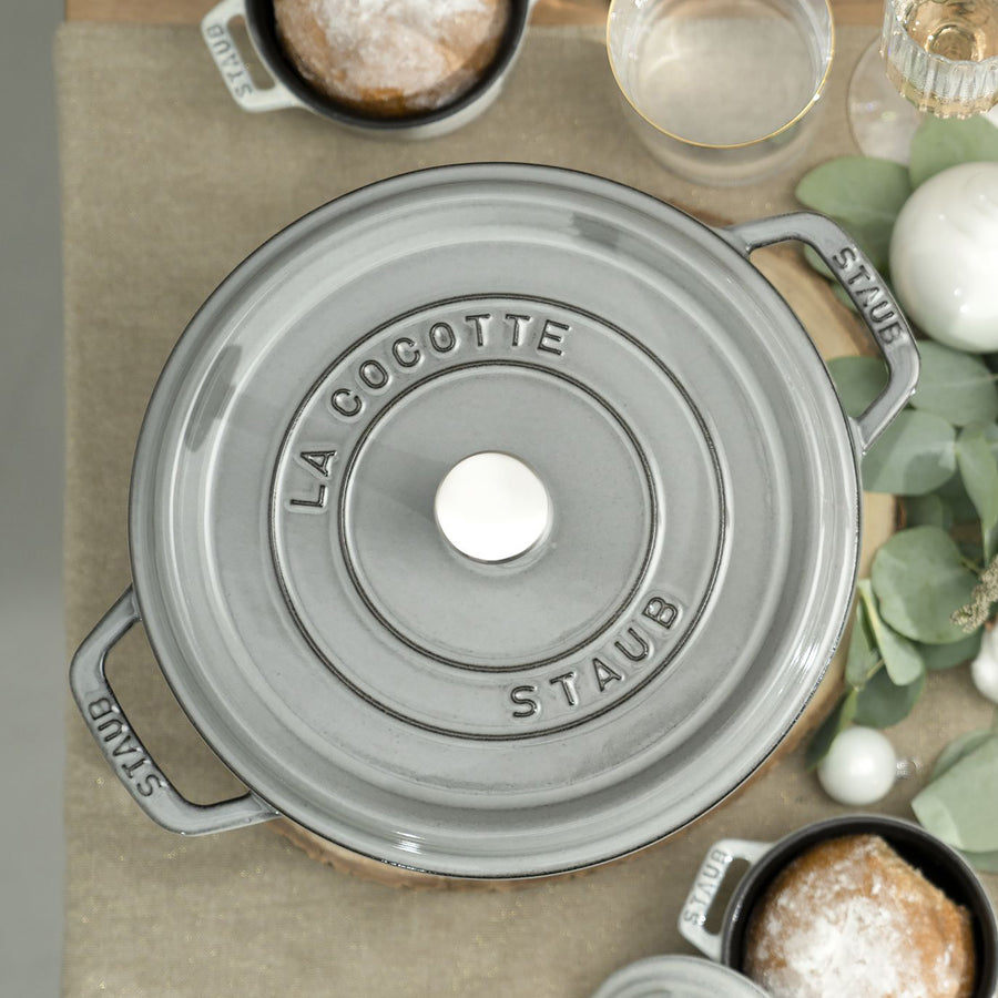  Staub Cast Iron 7-qt Round Cocotte - Graphite Grey, Made in  France: Dutch Ovens: Home & Kitchen